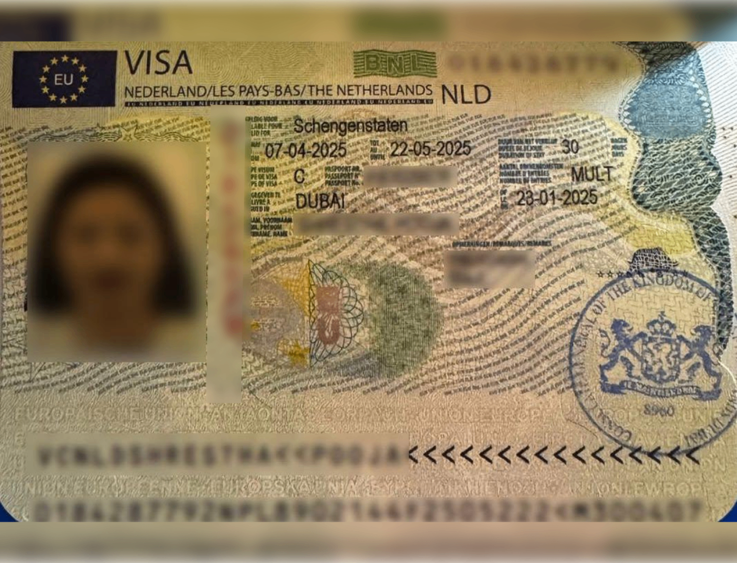 Netherlands Schengen Visa — approved client passport (personal details redacted)