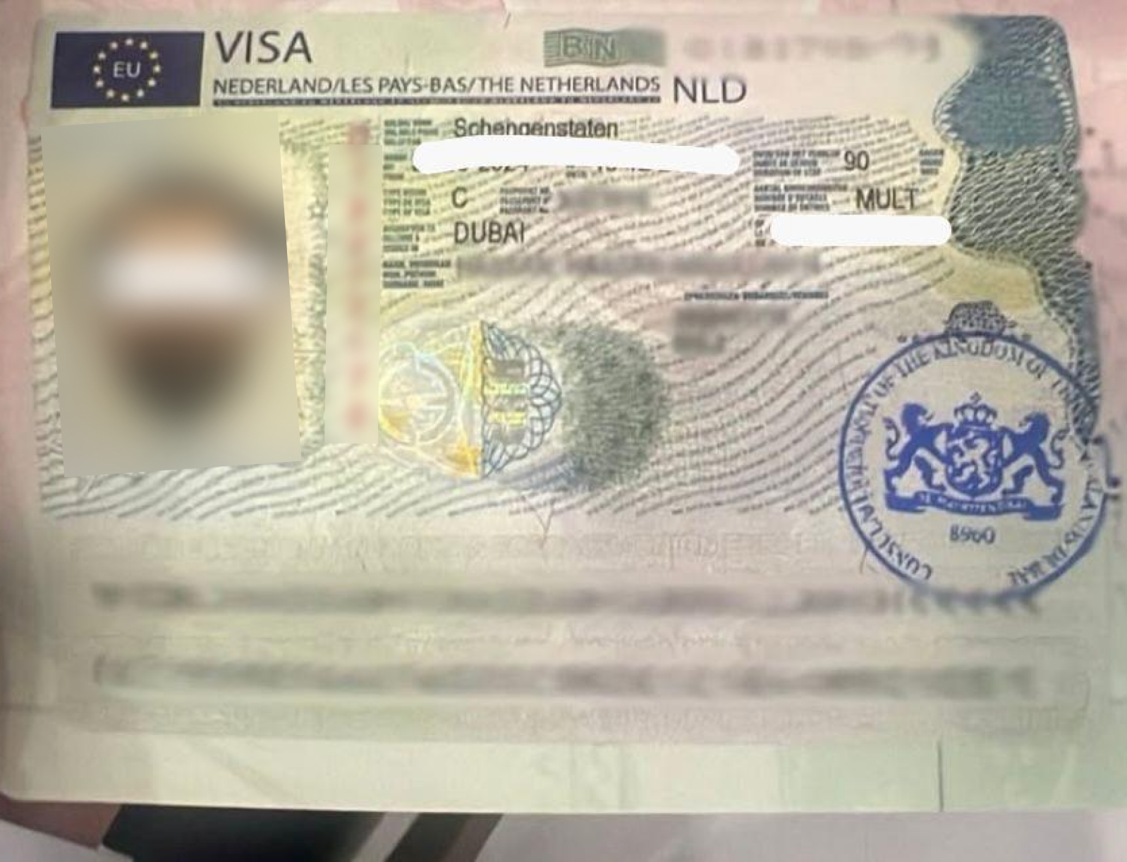 Netherlands Schengen Visa — approved client passport (personal details redacted)