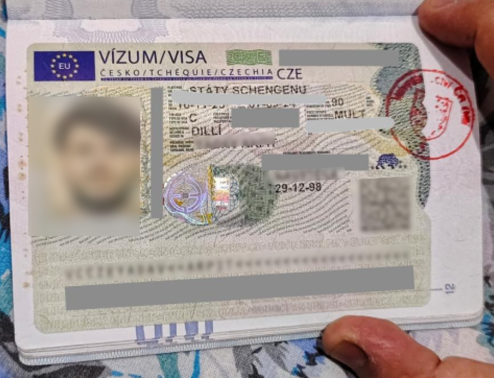Czechia Schengen Visa — approved client passport (personal details redacted)